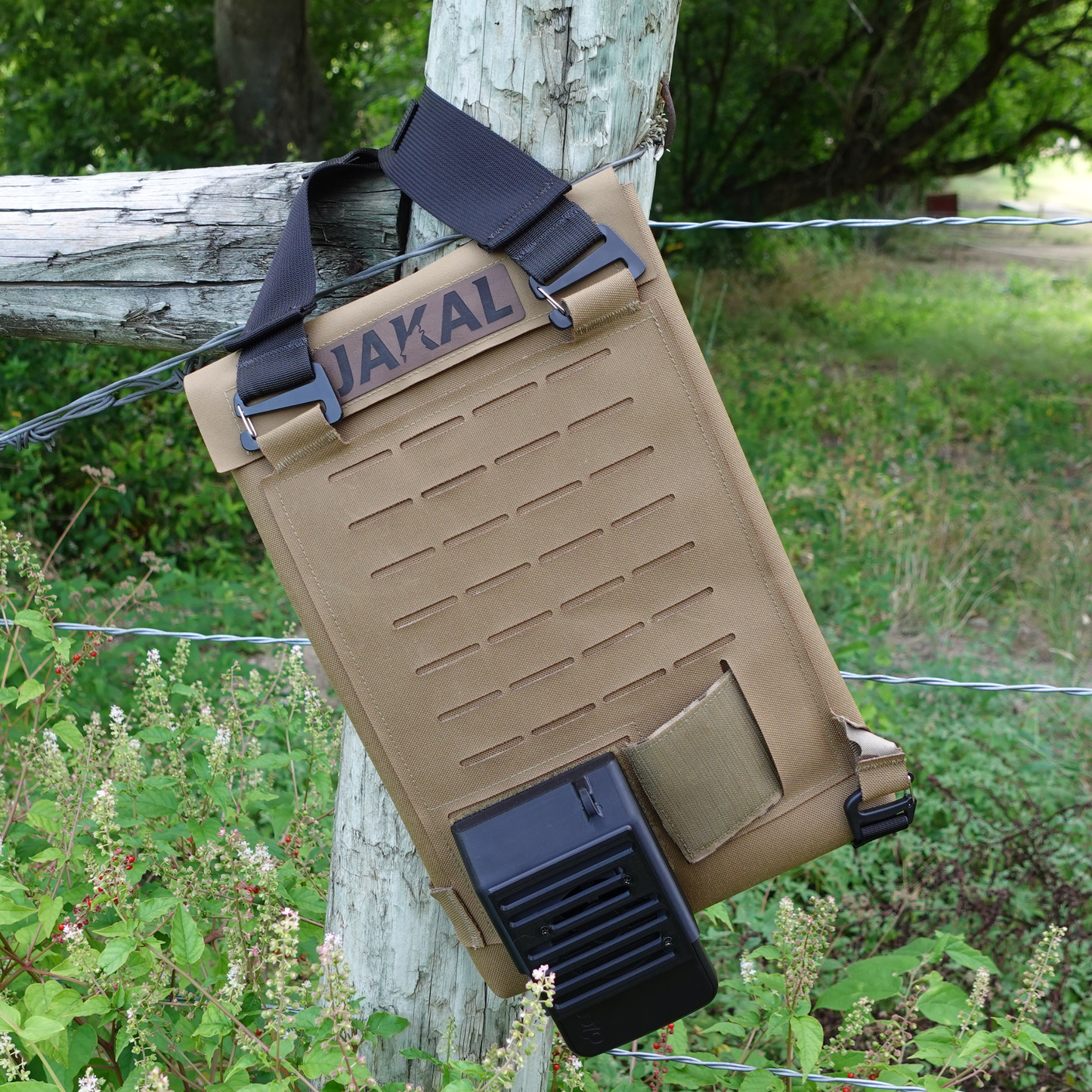 A Cooling Backpack on a fence. 